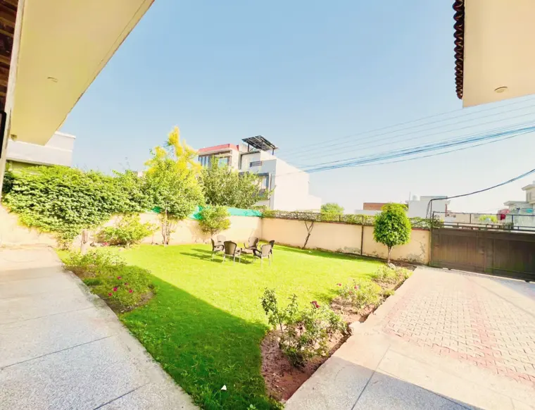 Garden and lawn seen from the covered porch