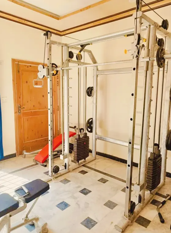 Gym with a cable machine and weights