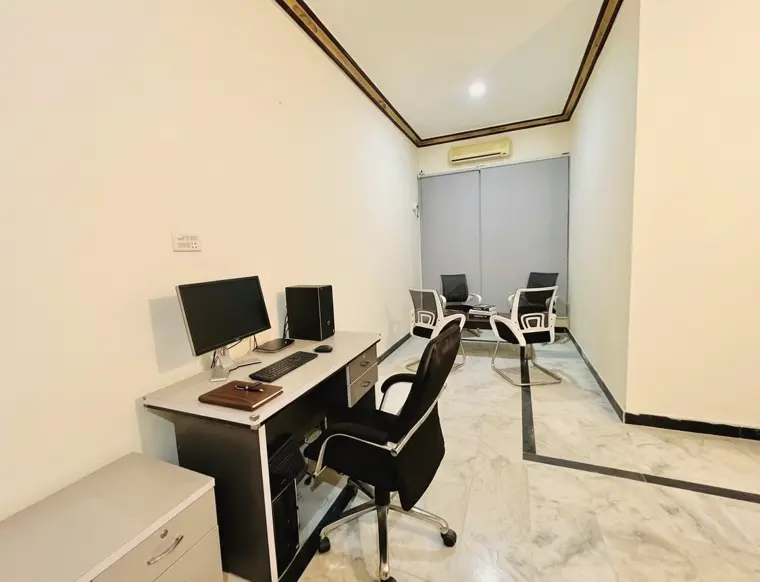 Psychiatrist's consultation office with desk and chairs