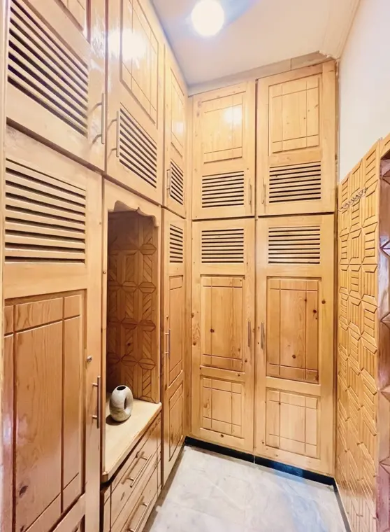 Built-in wooden wardrobes in a patient room